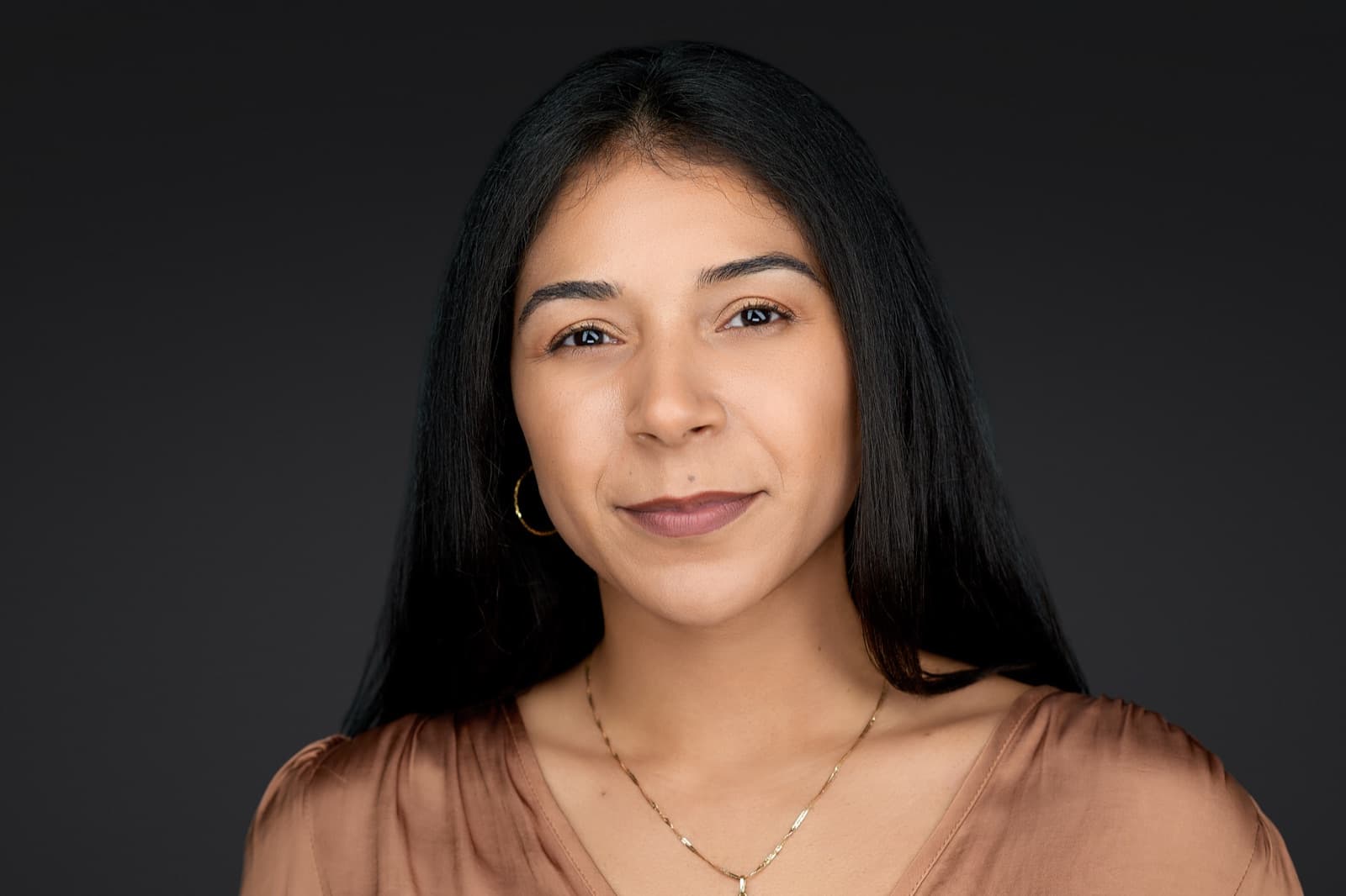 Set of individual headshots from a completed team session, smiling professionals against a white background.