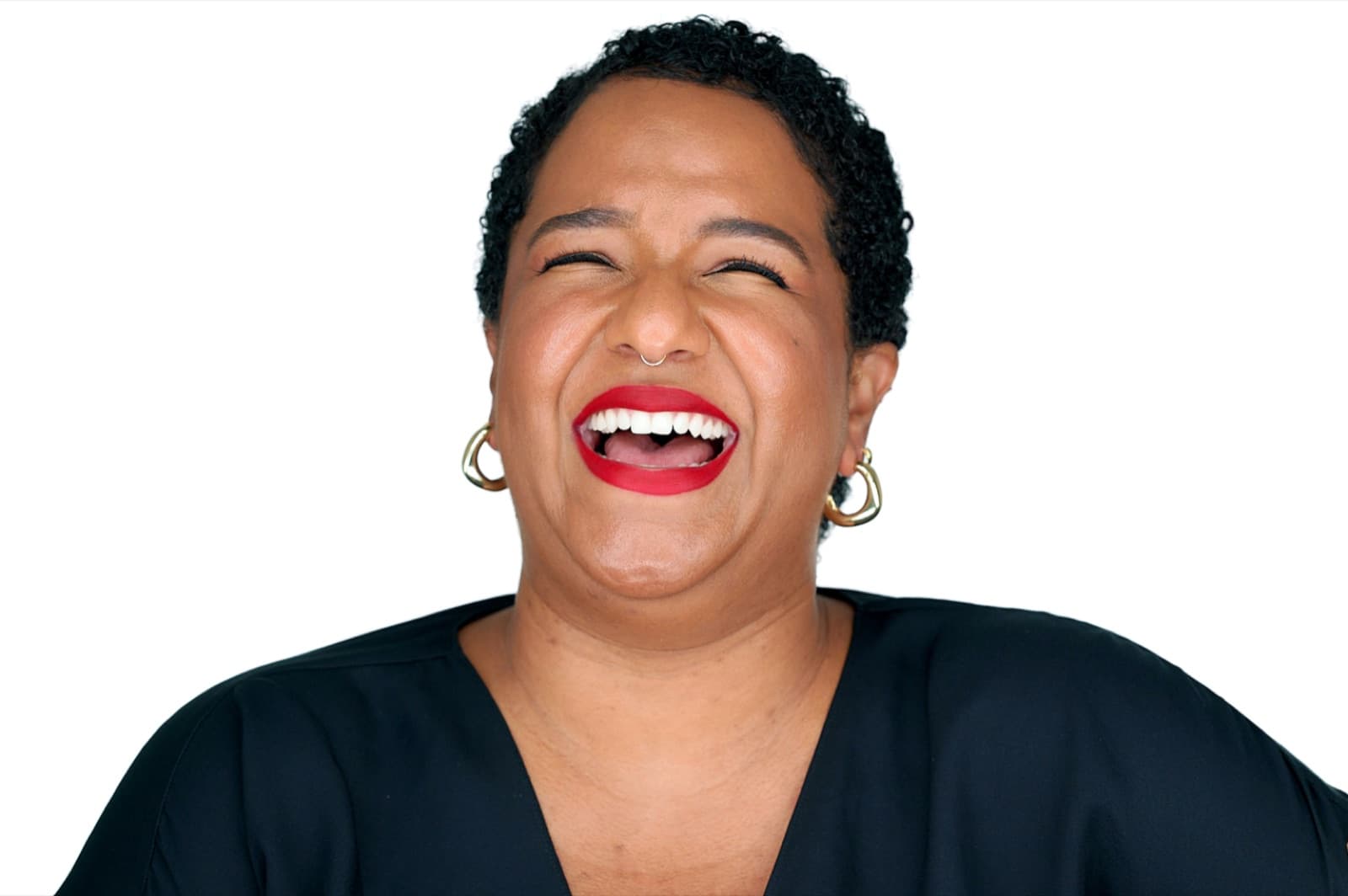 Set of individual corporate headshots, each person smiling against a plain white background.