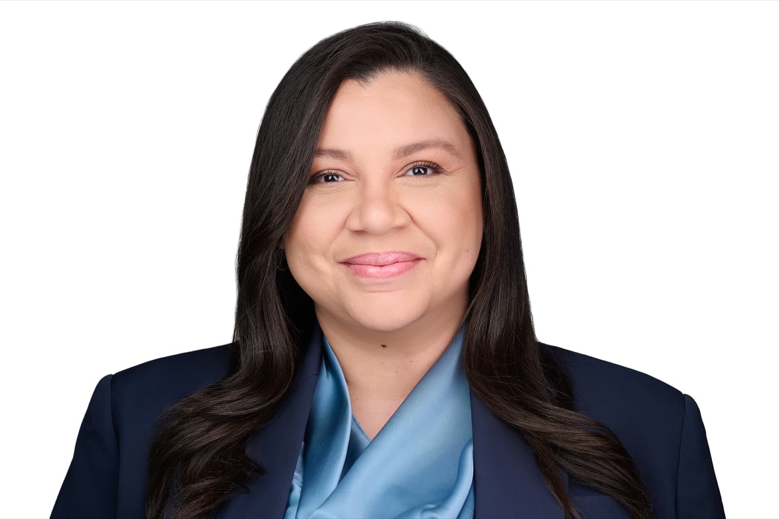 Set of individual headshots taken during a session, smiling professionals against a white background.