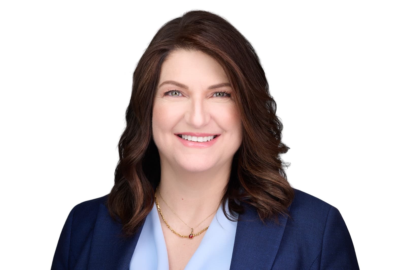 Set of individual headshots taken during a session, smiling professionals against a white background.