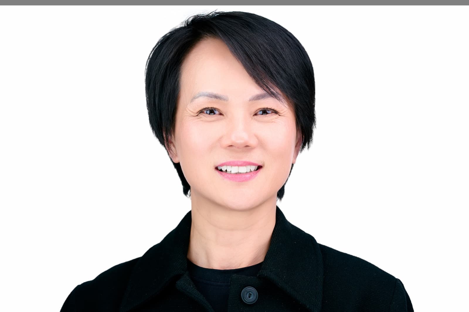 Set of individual headshots from a growing team, smiling professionals against a white background.