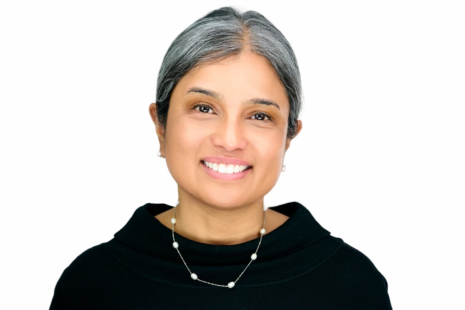 Set of individual headshots from a growing team, smiling professionals against a white background.
