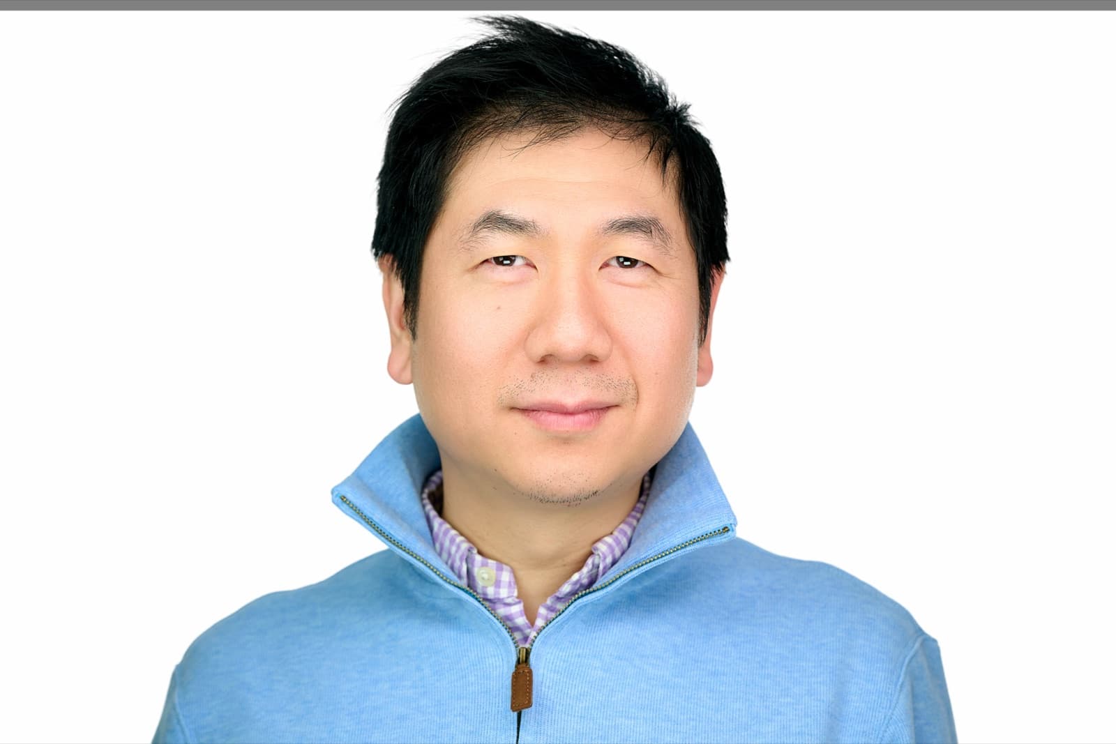 Set of individual headshots from a growing team, smiling professionals against a white background.