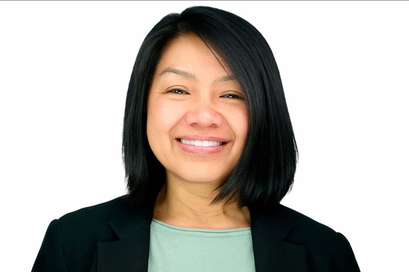 Set of individual headshots from a growing team, smiling professionals against a white background.