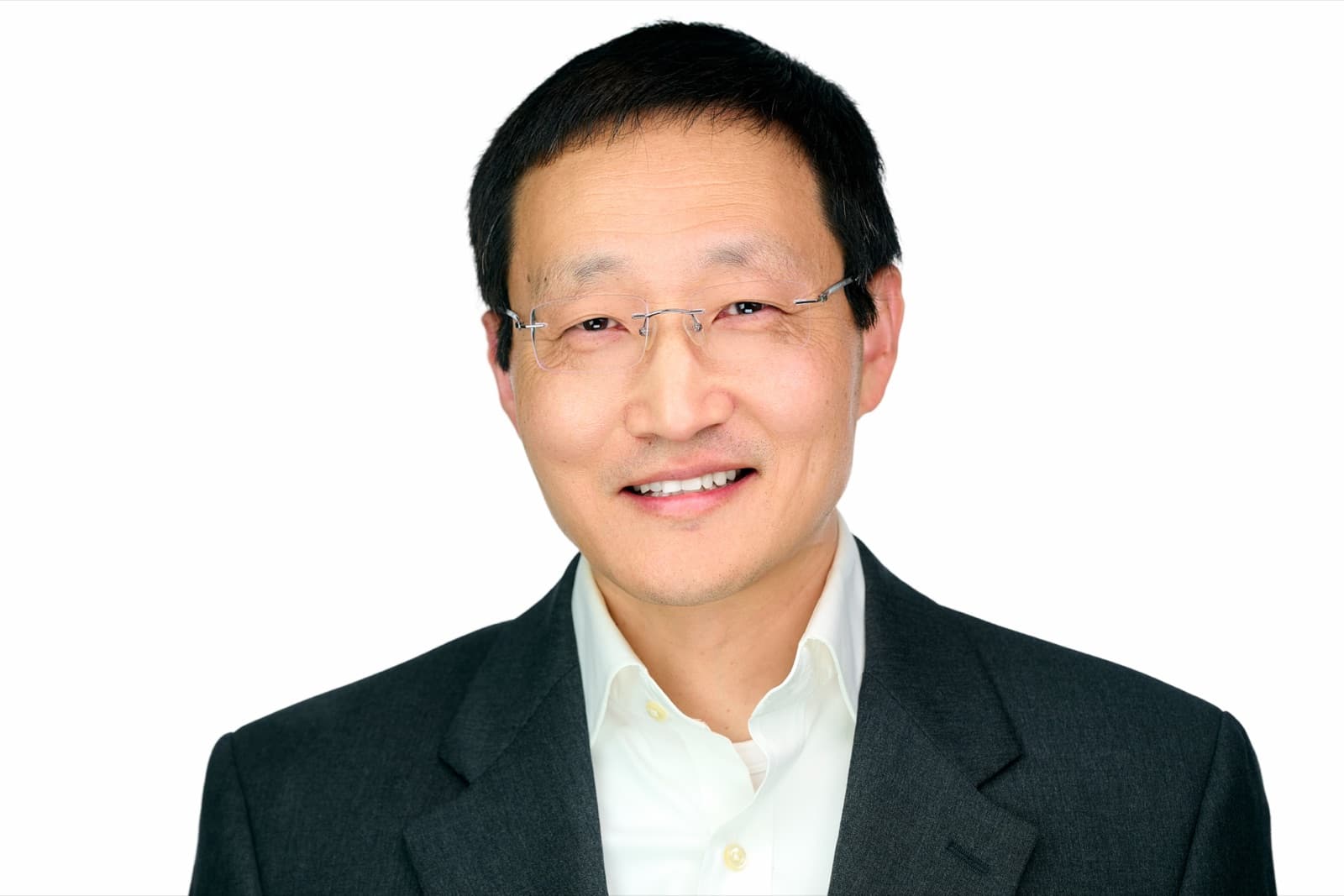 Set of individual headshots from a growing team, smiling professionals against a white background.