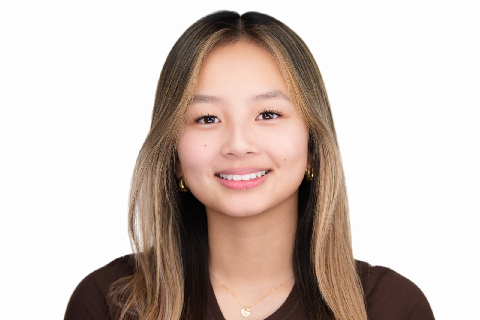 Set of individual booth headshots with playful expressions, including one person sticking out their tongue.