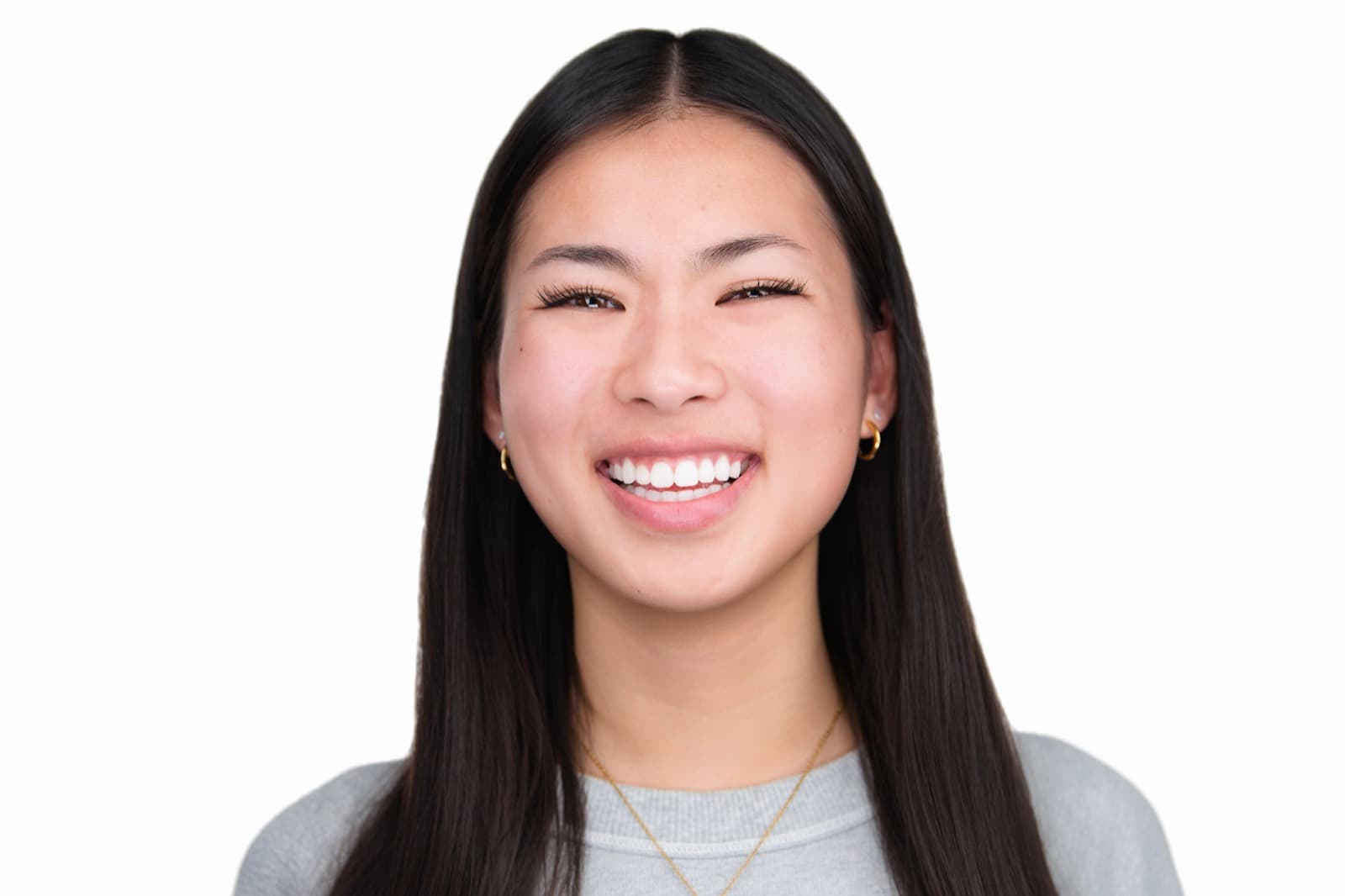 Set of individual booth headshots with playful expressions, including one person sticking out their tongue.