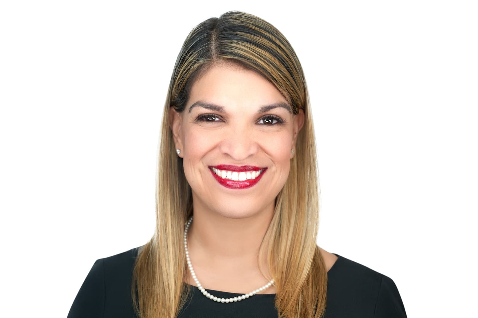 Set of individual headshots against white and gray studio backdrops, smiling professionals in business attire.