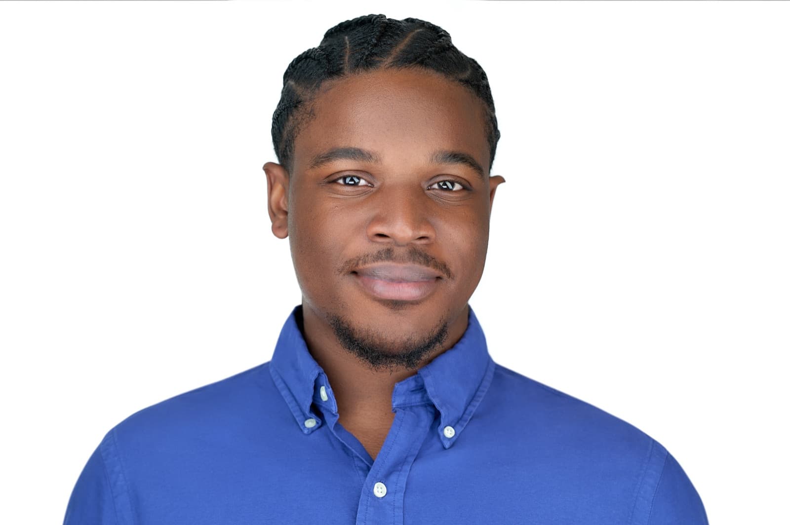 Set of individual headshots against white and gray studio backdrops, smiling professionals in business attire.