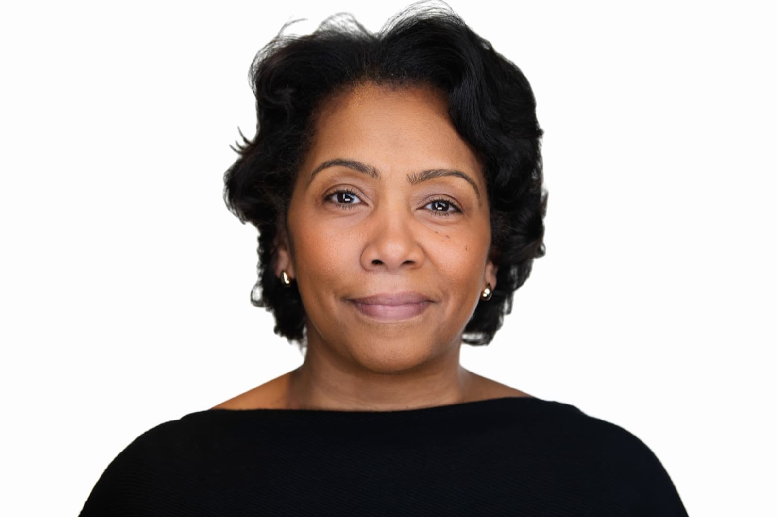 Set of individual booth headshots from a completed event, smiling against a white background.
