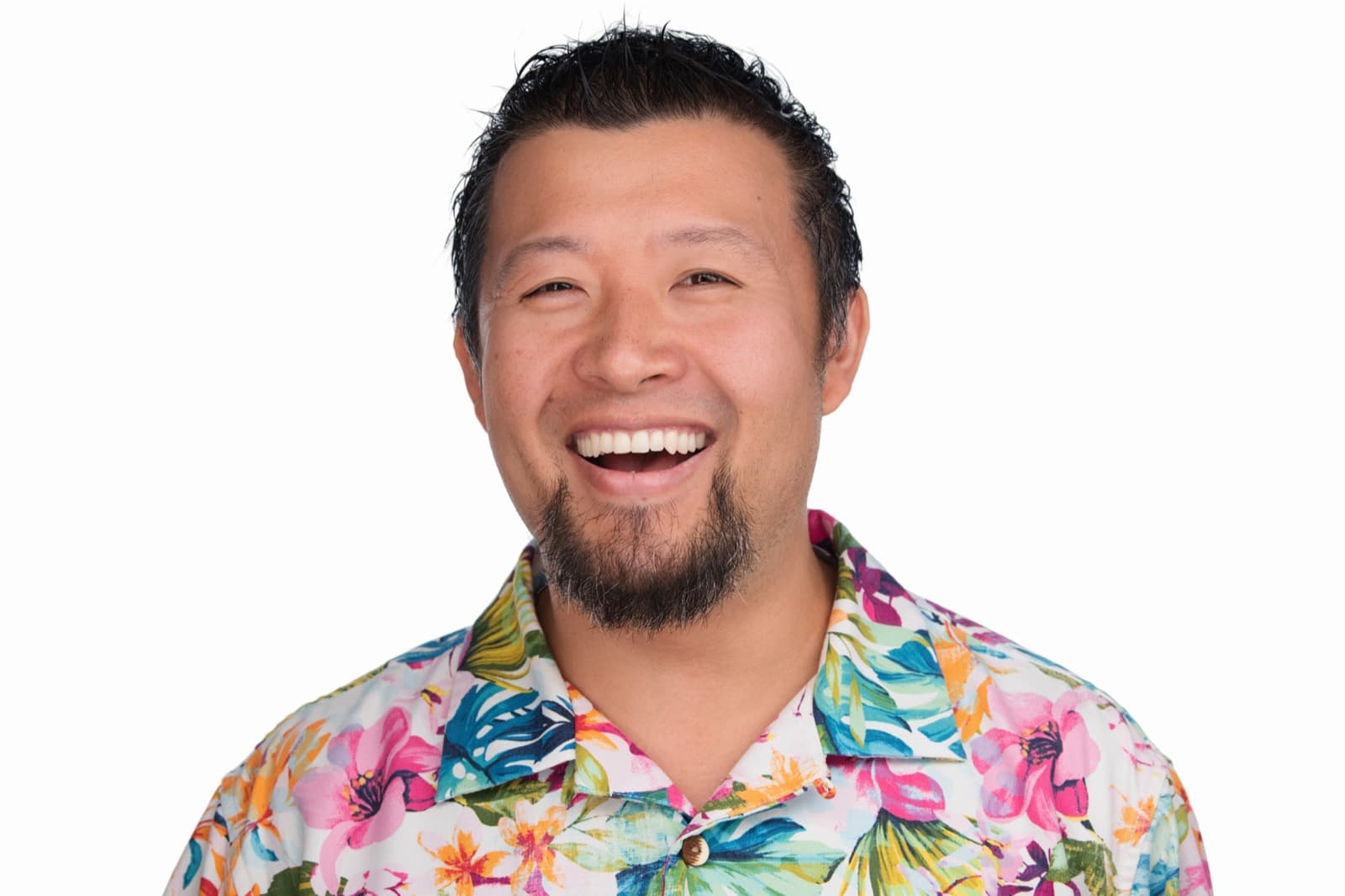 Set of individual booth headshots against a dark background, one wearing an event pin.
